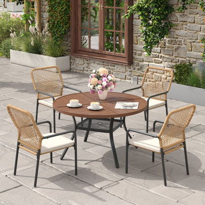 4-Person Outdoor Patio Dining Set With Stackable Rattan Chairs