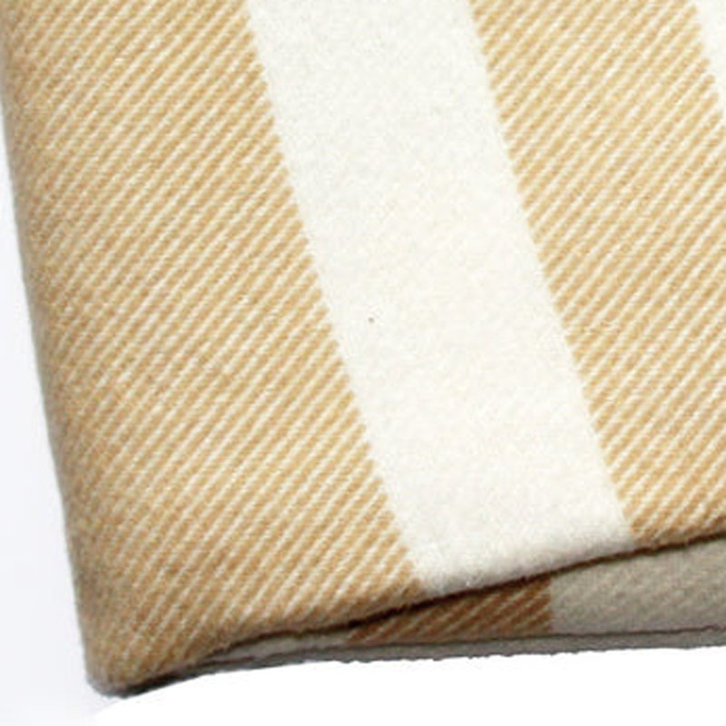 Jeté moelleux à carreaux beige avec pampilles