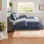 Ensemble de literie brodé bleu marine Elegant