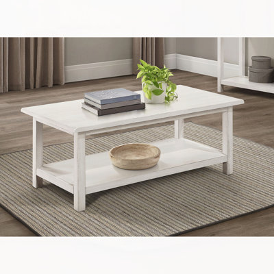 Distressed White Wood Coffee Table with Shelf