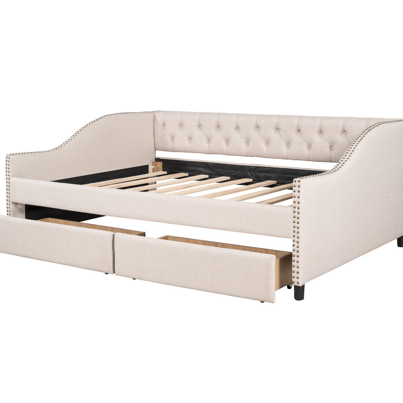 Lit de jour avec deux tiroirs en beige doux et construction en lattes de bois robustes - Apportez une atmosphère paisible à votre espace de vie et une structure résiliente