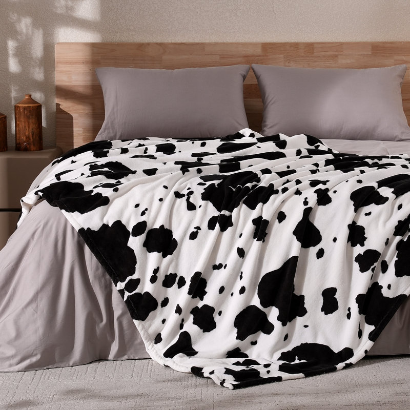 Jeté en peluche à imprimé animal Animal, L 60 po x L 80 po, Pois noirs