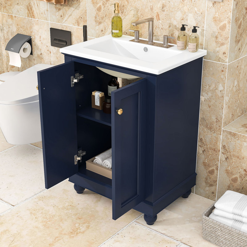 Meuble-lavabo 24 po avec lavabo en céramique, portes à fermeture en douceur, tablette intérieure réglable et dossier ouvert
