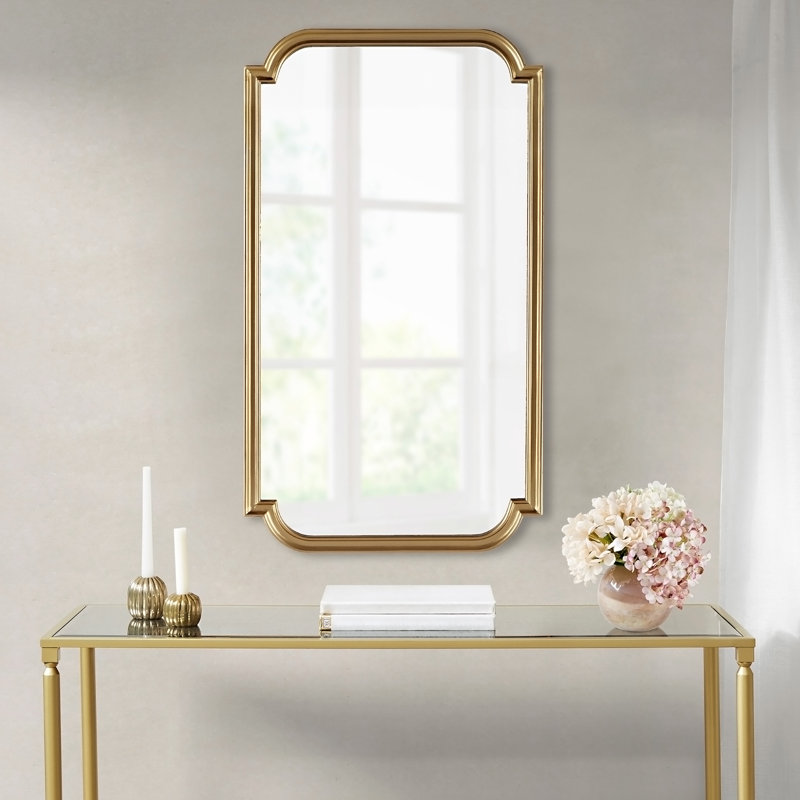 Miroir mural doré