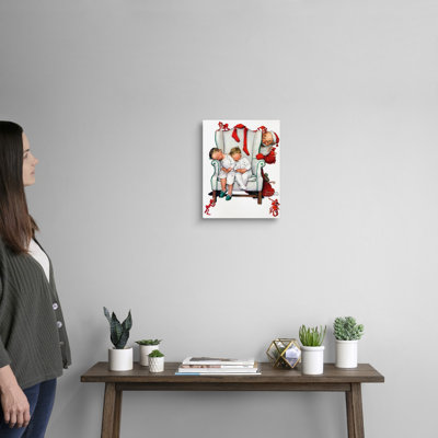 Père Noël remplissant les bas, art mural sur toile