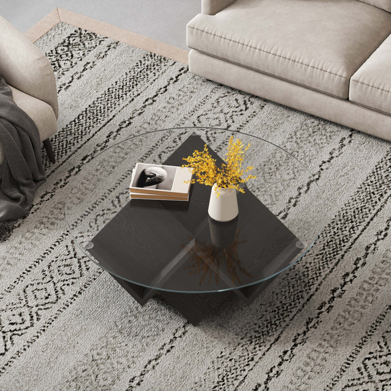 La table basse ronde avec plateau en verre et tablettes de rangement à motif géométrique abstrait Art Déco, 35,4 po