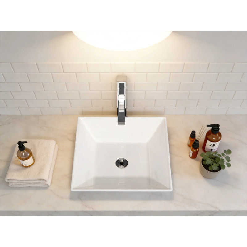 Vasque carrée en porcelaine vitrifiée blanche 40,6 x 40,6 cm (16 po x 16 po), à poser sur un meuble-lavabo avec bonde de 4,4 cm (1,75 po).
