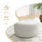 Niama Curved Chenille Storage Ottoman -607395563