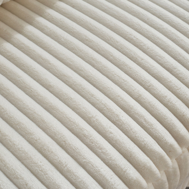 Canapé en velours côtelé moelleux avec dossier carré et réglable, idéal pour les chambres ouvertes. Blanc, mousse et ressorts. Largeur : 123 cm, profondeur : 155 cm, hauteur : 94 cm, poids : 63 kg. Modulable et flexible, il offre différentes postures, un bon maintien et une surface lisse.