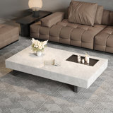 Simple rectangular rock slab floating coffee table