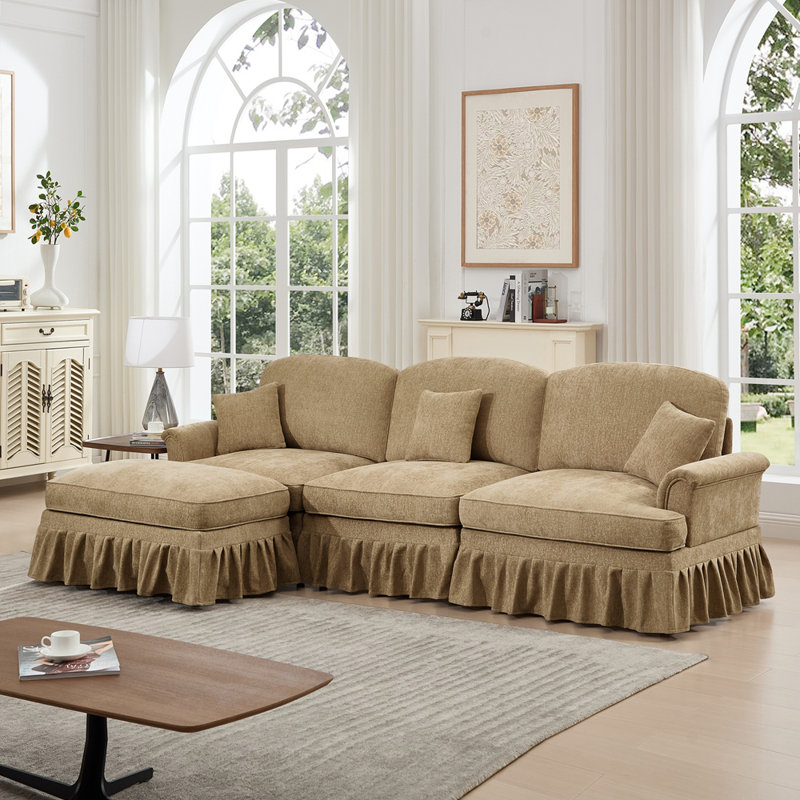 Canapé modulaire en forme de L Mid-Century à trois places avec accoudoirs évasés et volants amovibles, avec jupes plissées et pieds fuselés, canapé à 3 places en chenille confortable avec repose-pieds mobile