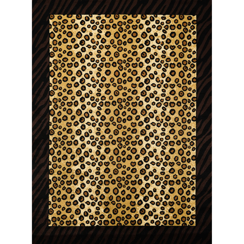 Tapis de 221 cm de long et 152 cm de large, beige et noir, de style rustique et sauvage, tissé à la machine en polypropylène à motif léopard.