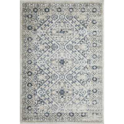 Tapis oriental bleu / crème en polypropylène tissé à la machine Aldos