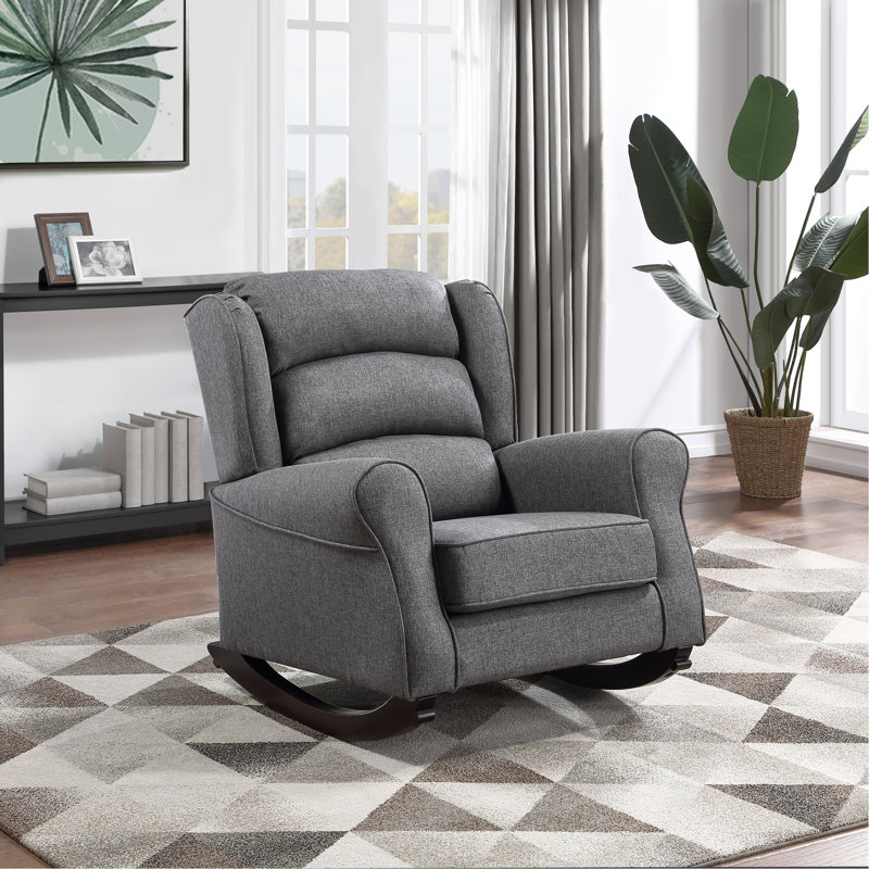 Chaise berçante grise avec accoudoirs évasés