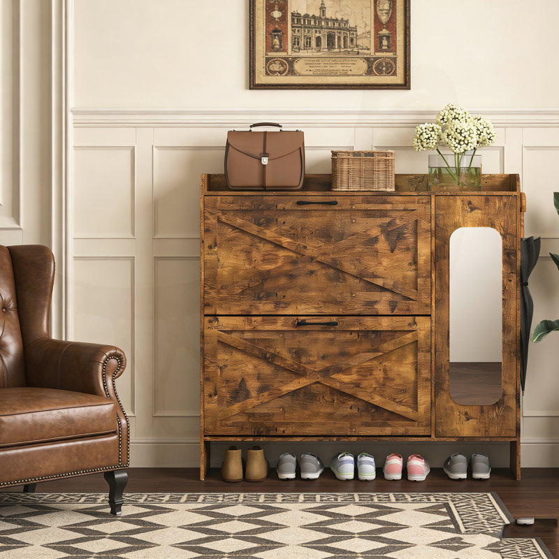 Armoire de rangement pour chaussures mince avec tiroirs rabattables, porte miroir et compartiments réglables pour l'organisation du vestibule.