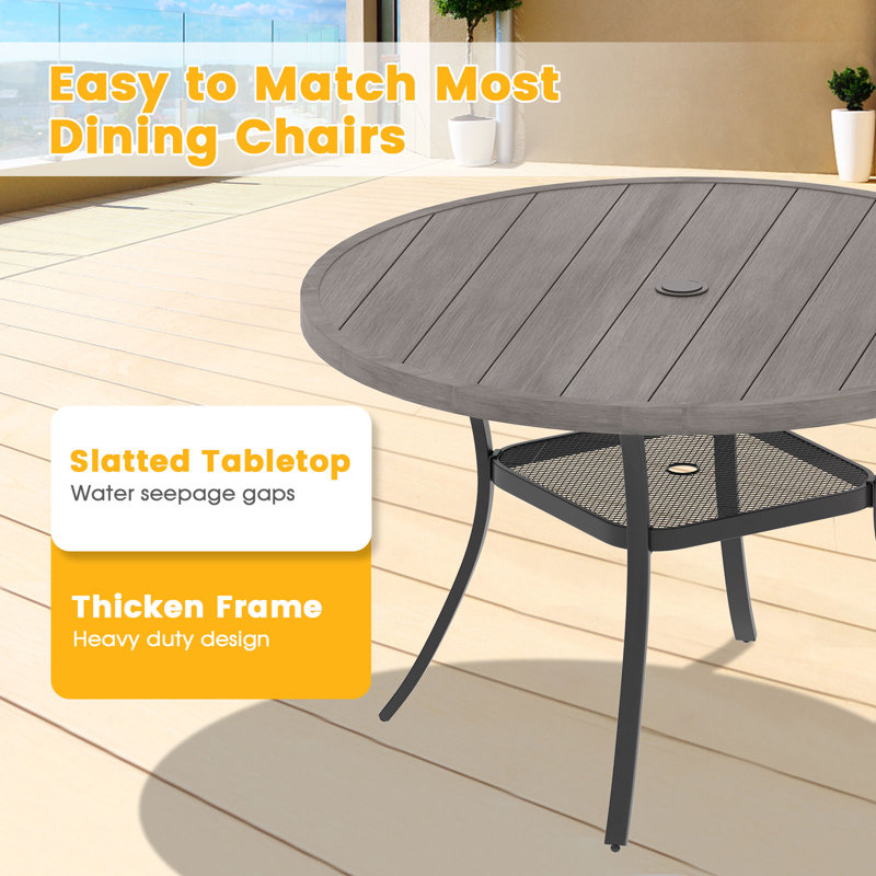 Derrica 6 - Person Patio Dining Set with Round Table, Brush Wood Gray
