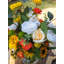 Tournesol et rose dans un vase