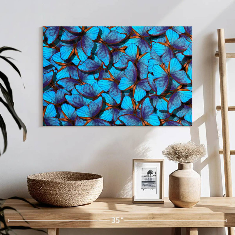 Essaim de papillons bleus