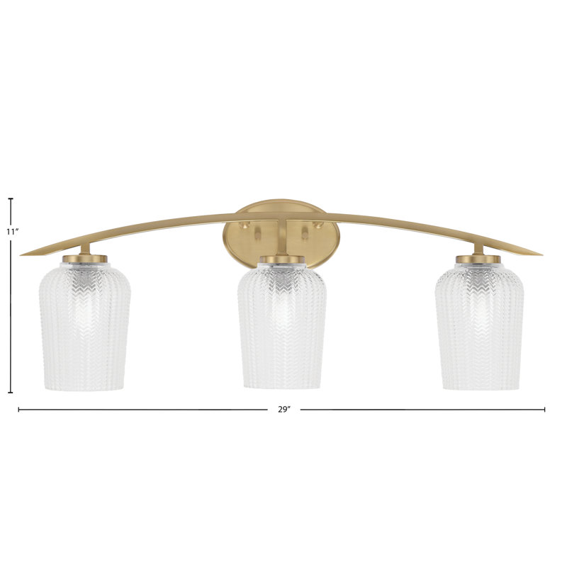 Barre d'éclairage de salle de bain 3 lumières avec verre texturé 5 po Kurve, Clair, Laiton