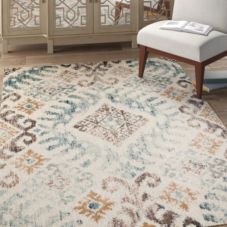 Tapis beige à motif géométrique Farwa