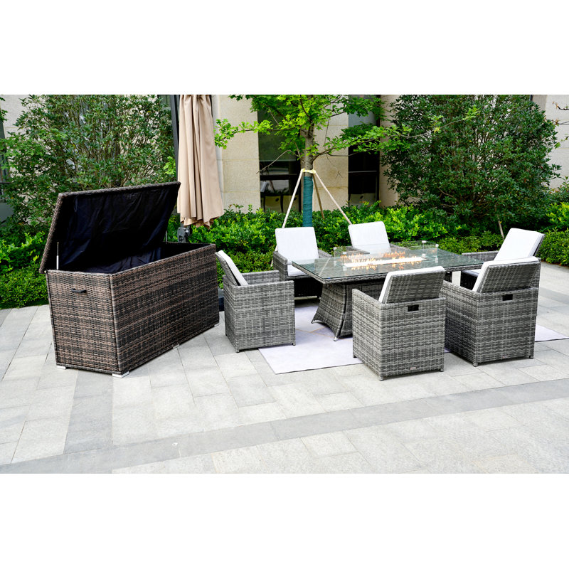 Varisha 6 - Person Wicker Patio Dining Set with Rectangular Table , Cushions Included