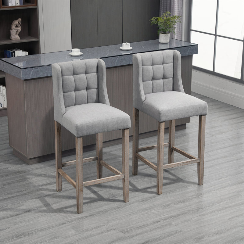 Charmants tabourets de bar rembourrés et capitonnés pour un intérieur élégant