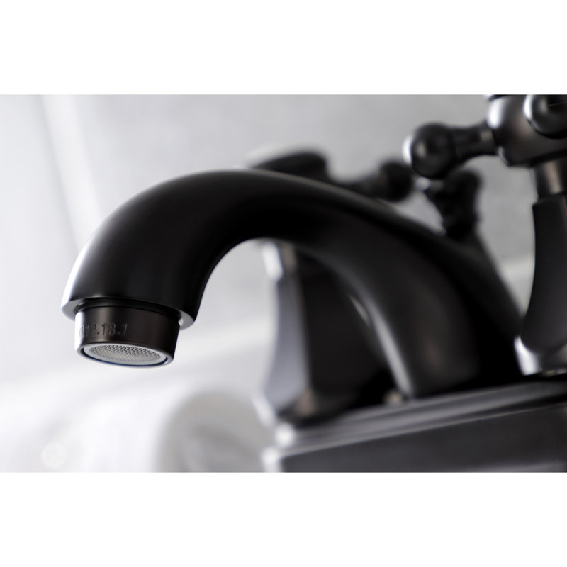 Kingston Brass Metropolitan Two-Handle 3-Hole Deck Mount 4" Centerset Bathroom Faucet with Plastic Pop-Up, Oil Rubbed Bronze