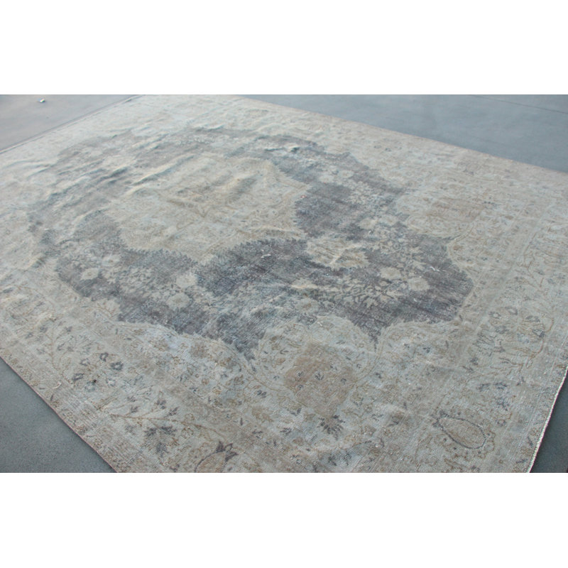 Un élégant tapis turc rétro à motif bleu-gris offre une touche de décoration unique pour votre espace de vie