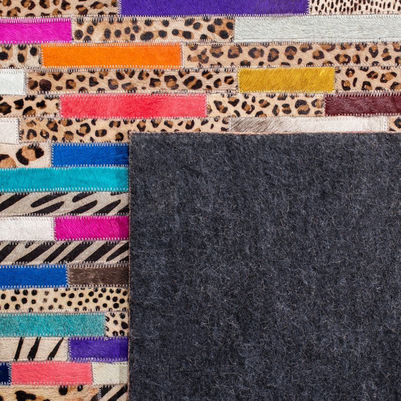 Knightsville Hand Woven Leather/Felted Cloth Animal Print Rug in Ivory/Blue, Rectangle 4' x 6'