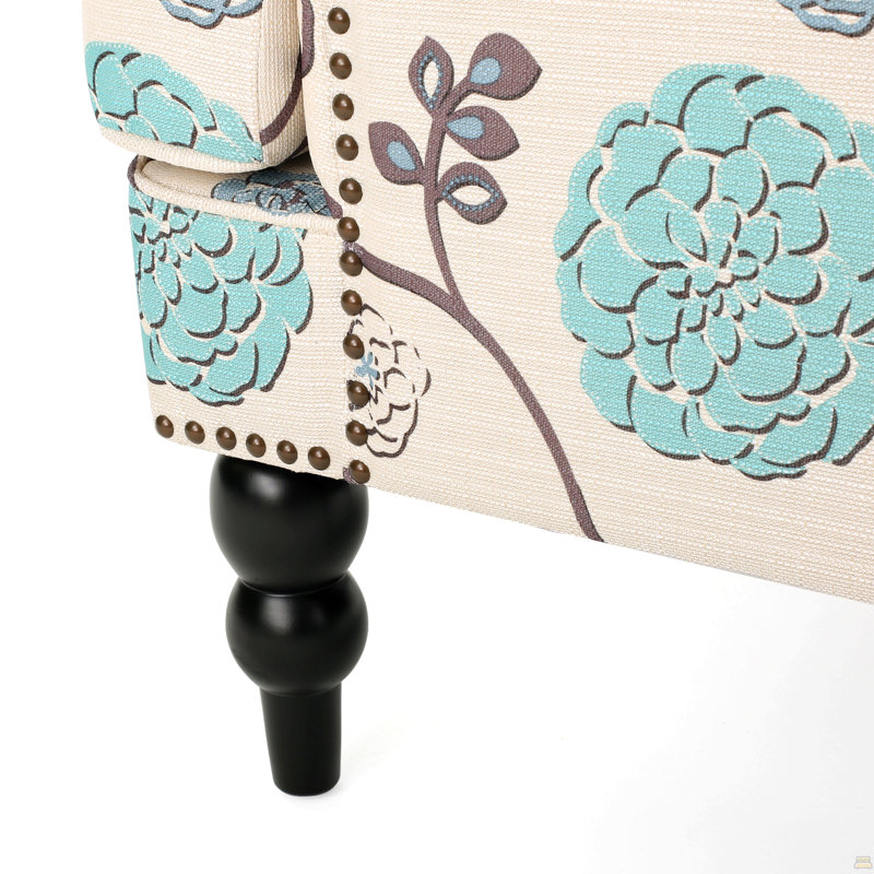 Fauteuil club capitonné