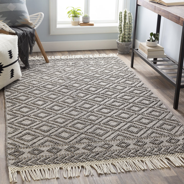Tapis noir / blanc en laine tissé à plat à la main à motif géométrique Carletta