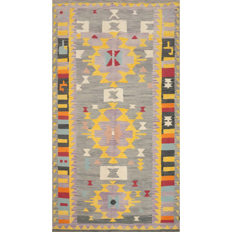 Tapis artistique Kilim 5 x 8 avec des formes géométriques aux couleurs vives