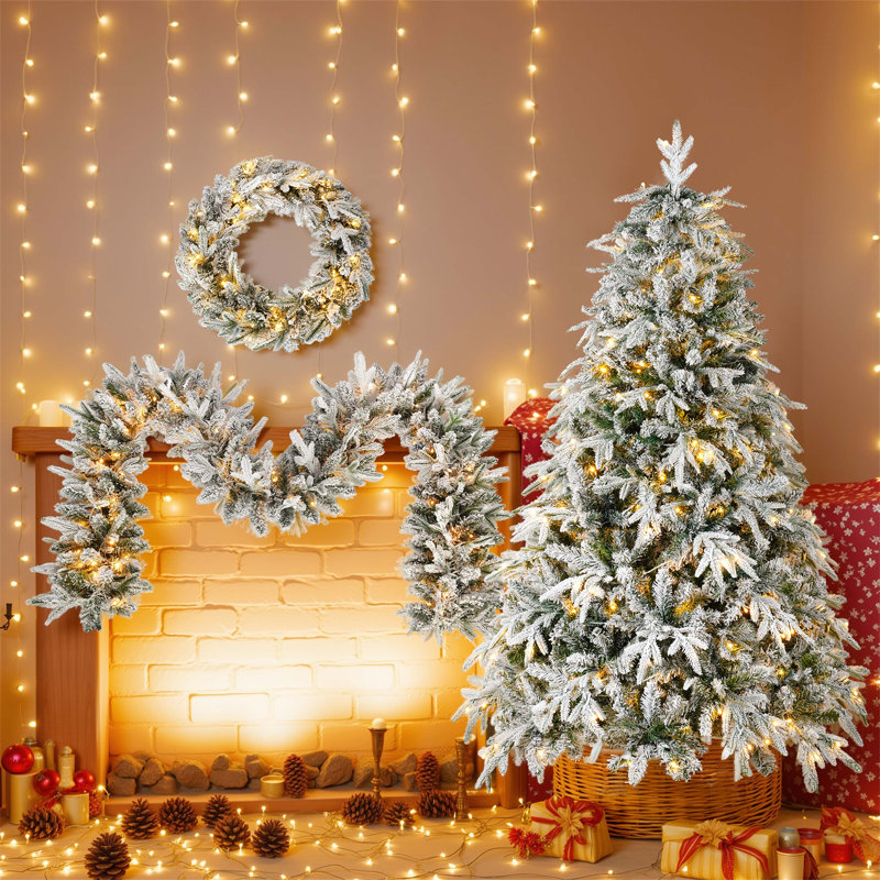 Ensemble de décoration de Noël enneigé avec lumières DEL chaudes, y compris une couronne, une guirlande et un arbre pour une atmosphère de vacances magique