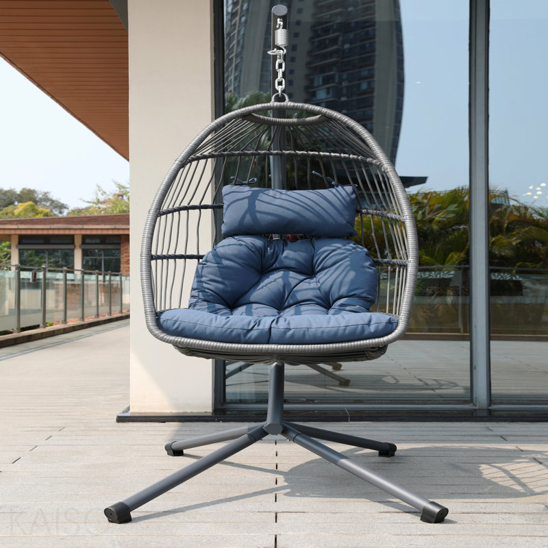 Fauteuil à œufs avec coussin bleu et support