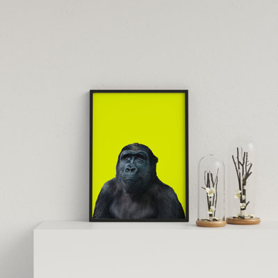 Young Gorilla On Yellow Background by Vouvart - Single Picture Frame Print