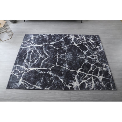 Tapis noir Arnoldas
