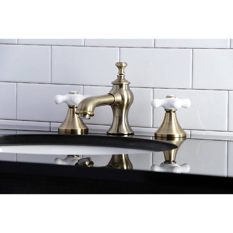 Kingston Brass Vintage Two-Handle 3-Hole Deck Mount Widespread Bathroom Faucet with Brass Pop-Up Drain, Vintage Brass