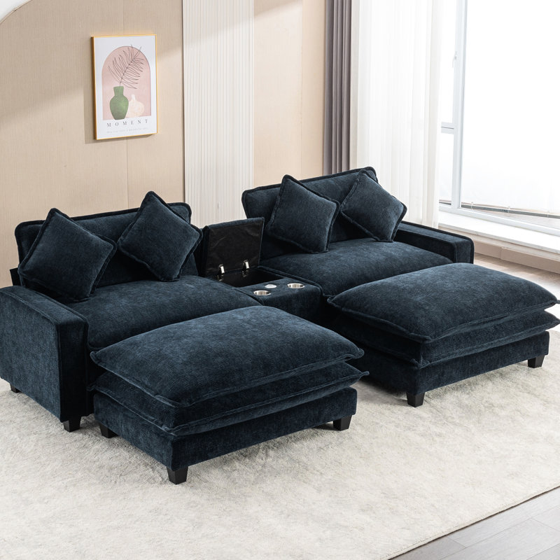 4 sièges bleus, coussins doubles, hublots, porte-gobelets et repose-pieds amovibles pour un confort de détente dans le salon