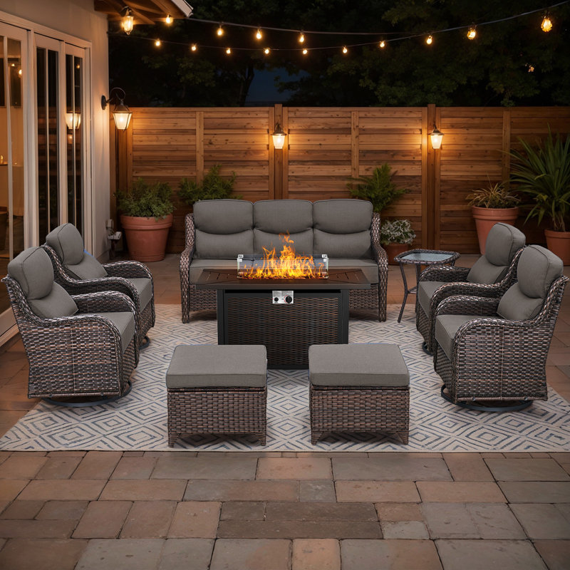 Abbey 9-Piece Wicker Patio Furniture Sofa Set With Fire Pit Table, 6-Inch Thick Cushion Swivel Glider Chairs & Ottomans, 9