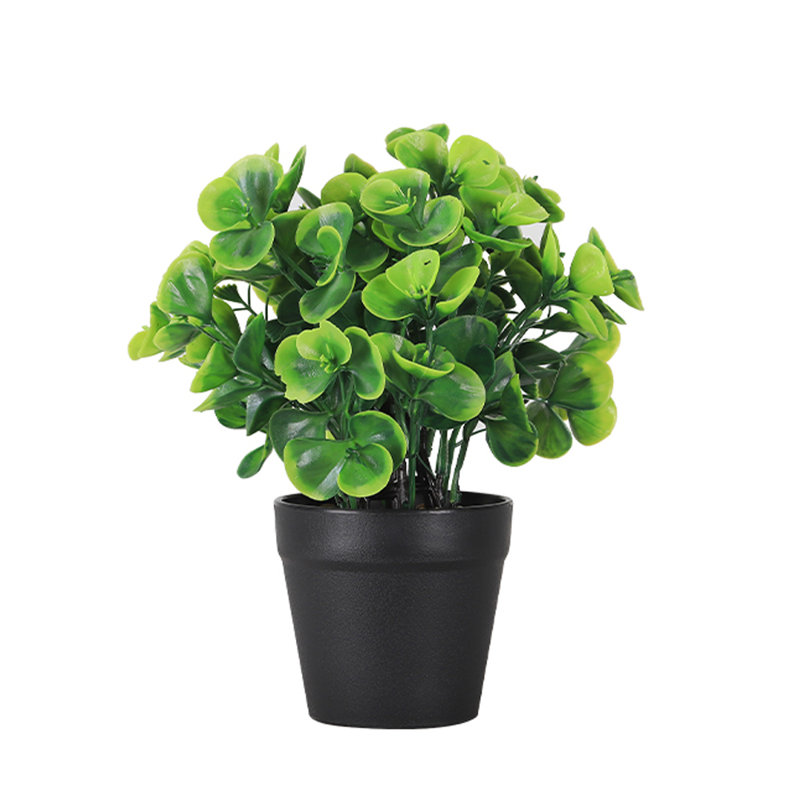 Plante artificielle verte en pot