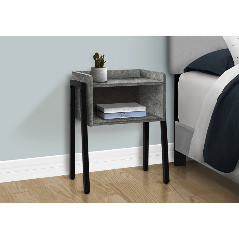 Table de bout contemporaine avec aspect de pierre et pieds en métal noirs robustes