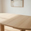 Table de salle à manger Hiny, base piédestal, plateau en bois blanc extensible de 60 à 78 pouces