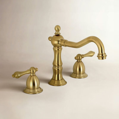 Kingston Brass Heritage Two-Handle 3-Hole Deck Mount Widespread Bathroom Faucet with Brass Pop-Up Drain