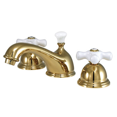 Kingston Brass Restoration Two-Handle 3-Hole Deck Mount Widespread Bathroom Faucet with Brass Pop-Up Drain