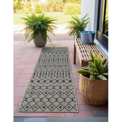 Tapis intérieur / extérieur gris clair Jaylah Southwestern