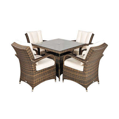 Harpenden 4 - Person Wicker Patio Dining Set with Square Table , Cushions Included