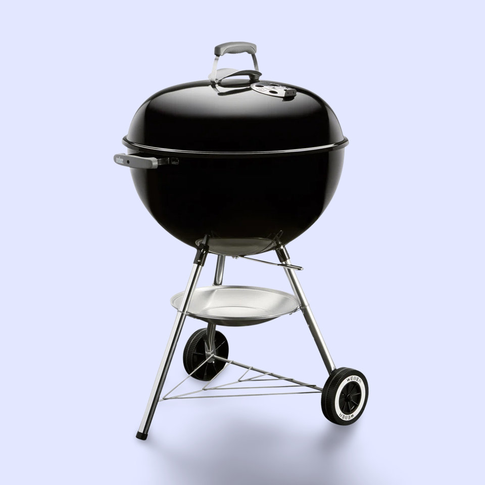 Weber kettle charcoal grill in black.