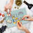 Ambesonne Winter Tempered Glass Cutting Board Hello Text Funny Face Multicolor