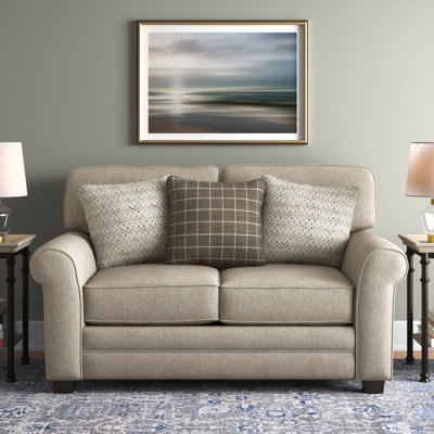 Annora 62" Rolled Arm Loveseat with Reversible Cushions by Three Posts