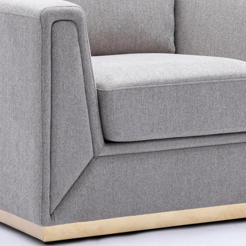 Chaise d'appoint grise avec coussin